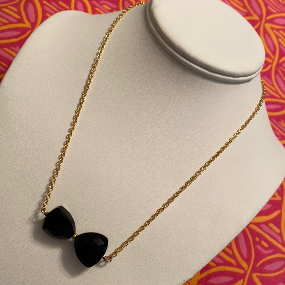 Gold Chain Necklace with Black Faceted Bow Pendant